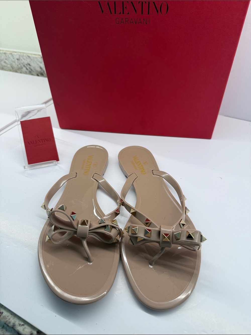 Valentino Garavani Nude/Beige Bow Studded Jelly Sandals